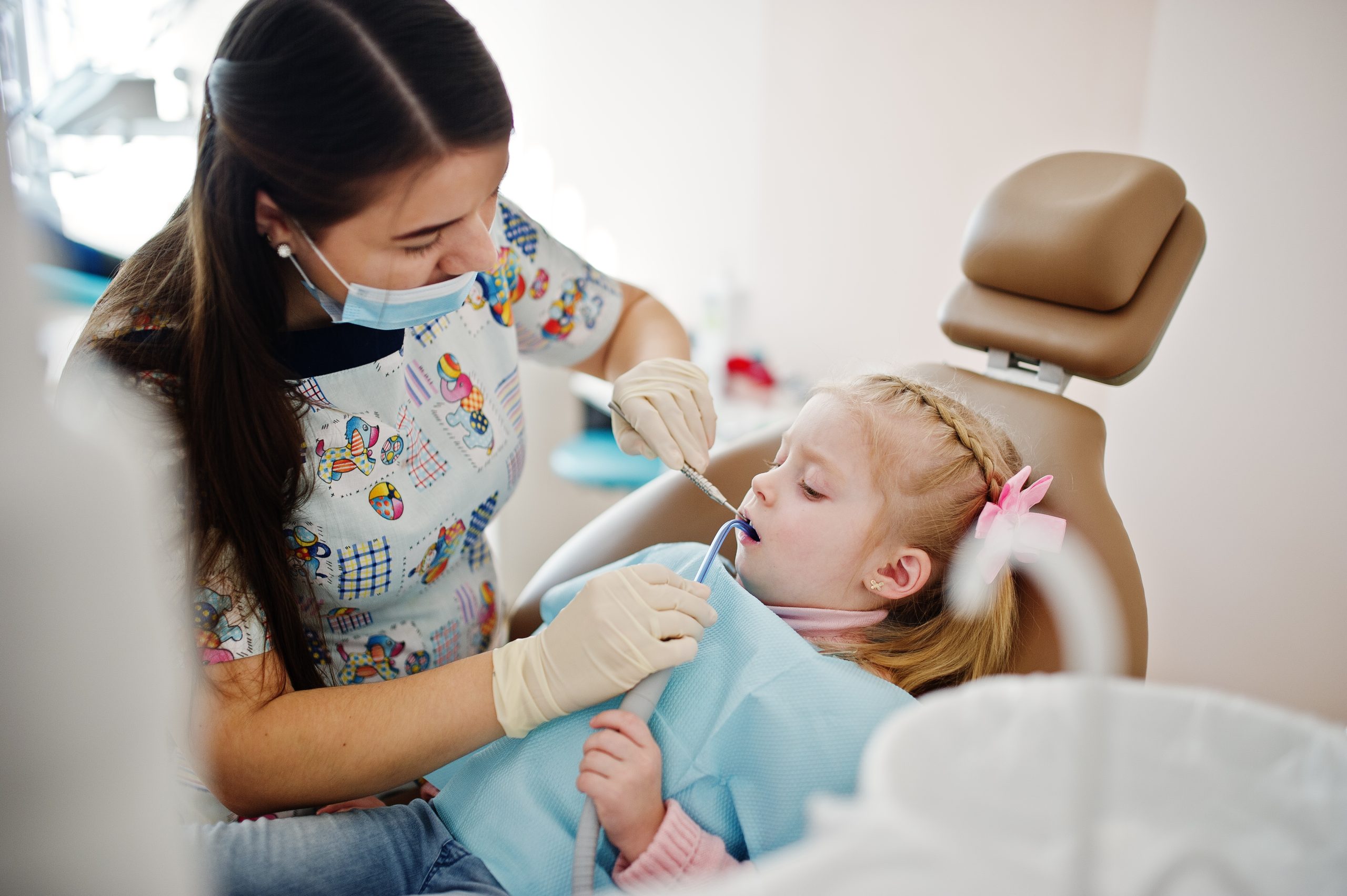 Little baby girl at dentist